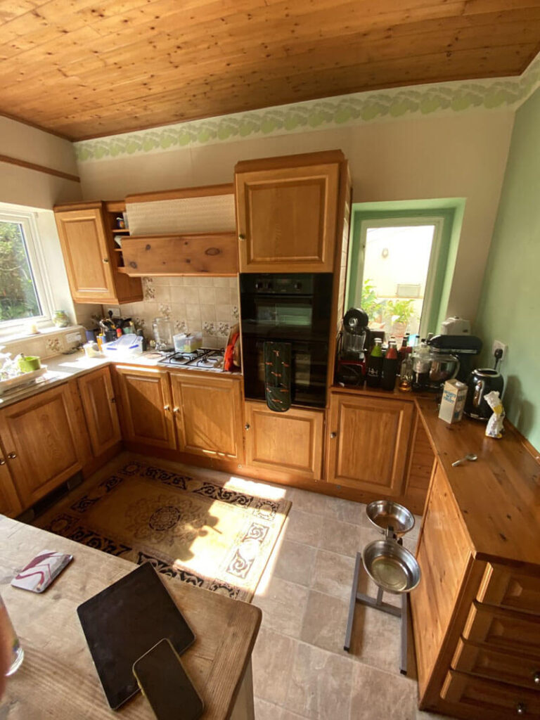 Our client's old-fashioned pine kitchen and outdated décor