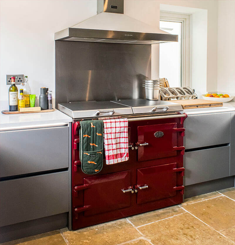 The red Everhot range cooker offers a welcome dash of colour