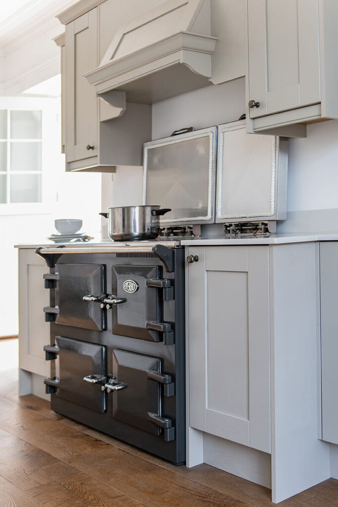 The Everhot range cooker is surrounded by a bespoke-designed breakfront canopy