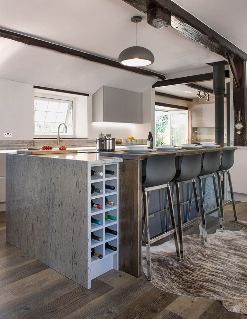 Kitchen island ideas: Many of our kitchen islands are also used to showcase wine collections